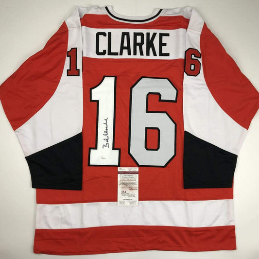 Autographed/Signed Bob Bobby Clarke Philadelphia Orange Hockey Jersey JSA COA