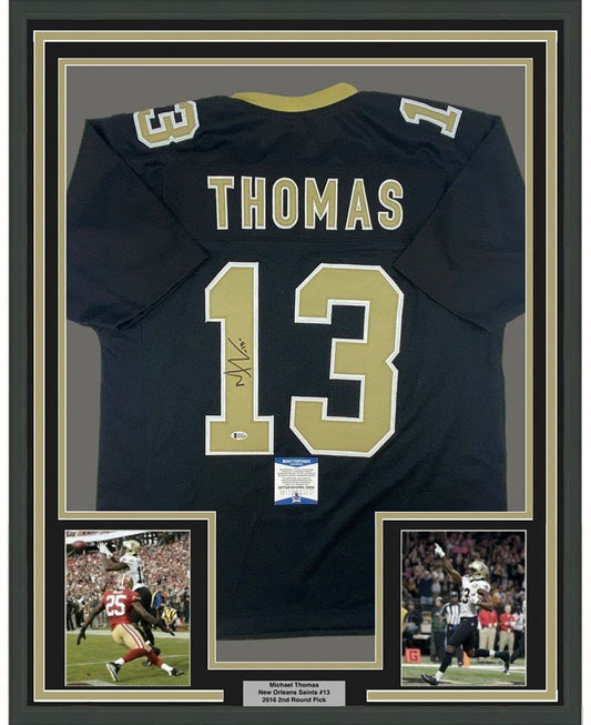Framed Autographed/Signed Michael Thomas 35x39 New Orleans Black Football Jersey Beckett BAS COA