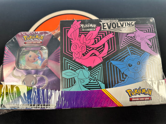 Evolving Skies Elite Trainer Box (Vaporeon) + Window Tin (Mew)