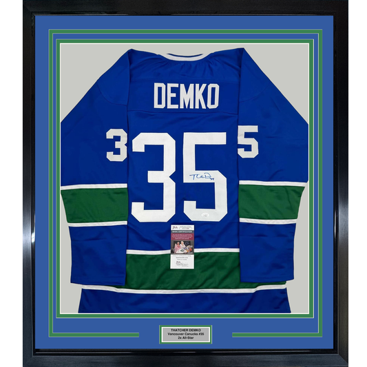 Framed Autographed/Signed Thatcher Demko 35x39 Vancouver Blue Hockey Jersey JSA COA