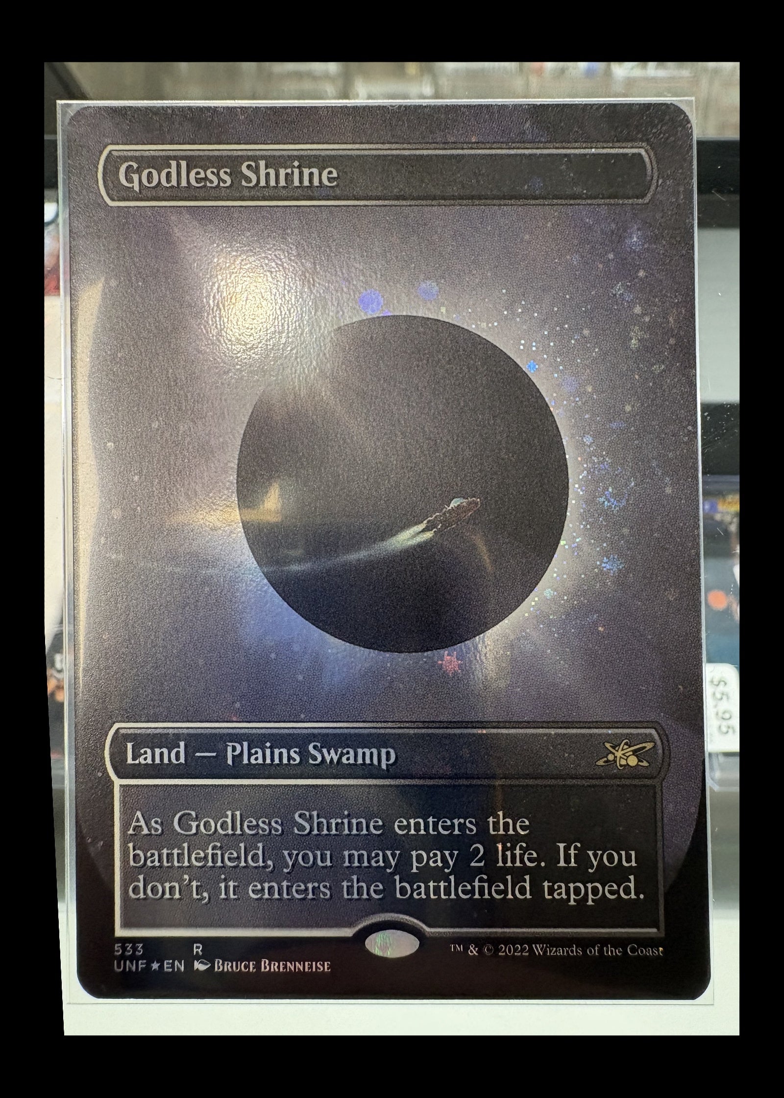 Godless Shrine #533 Unfinity borderless Galaxy Foil Magic card front - full photographed perimeter retained with black safety border